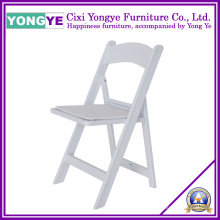 Cadeira de dobradura da categoria comercial da resina branca com assento acolchoado
